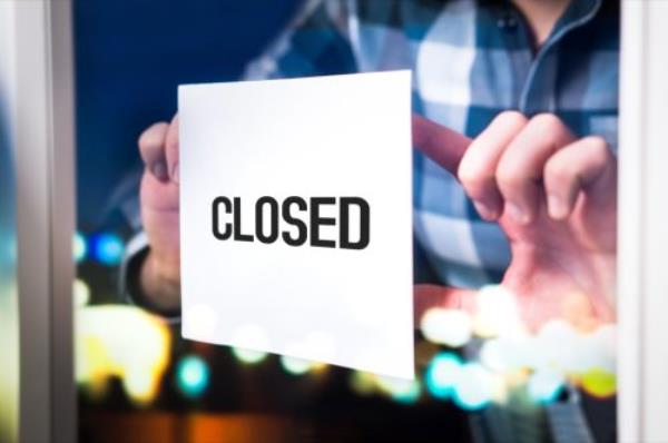 closed sign in store window