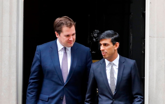 Robert Jenrick leaving Downing Street with Rishi Sunak 
