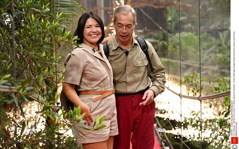 Nigel Farage embraces his girlfriend, Laure Ferrari, as he finishes third on I'm a Celebrity